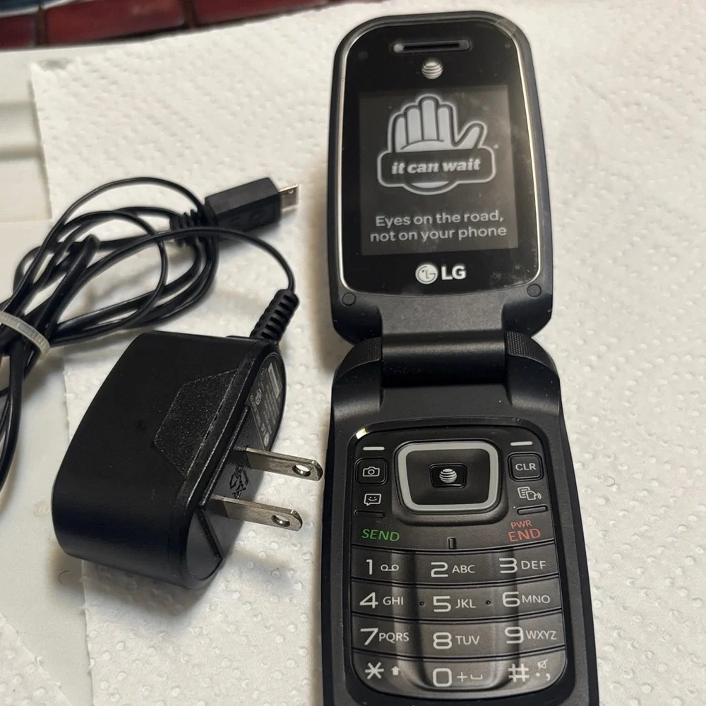 LG Black New Flip Phone with old Charger Included
